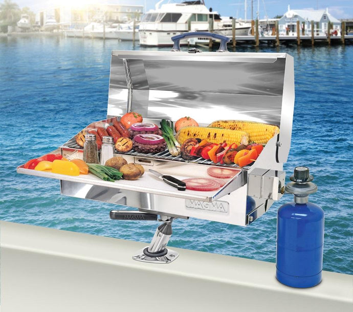 Cabo Rectangular grill mounted on boat with grilled hamburgers and vegetables